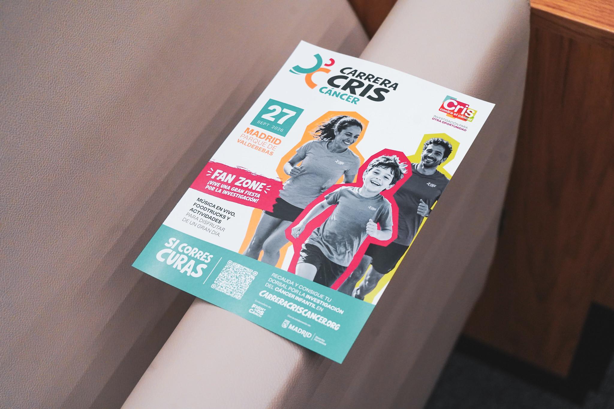 Cartel promocional de la Carrera Cris contra el cáncer en Madrid.